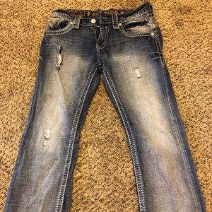 Men’s distressed Rock Revival jeans
